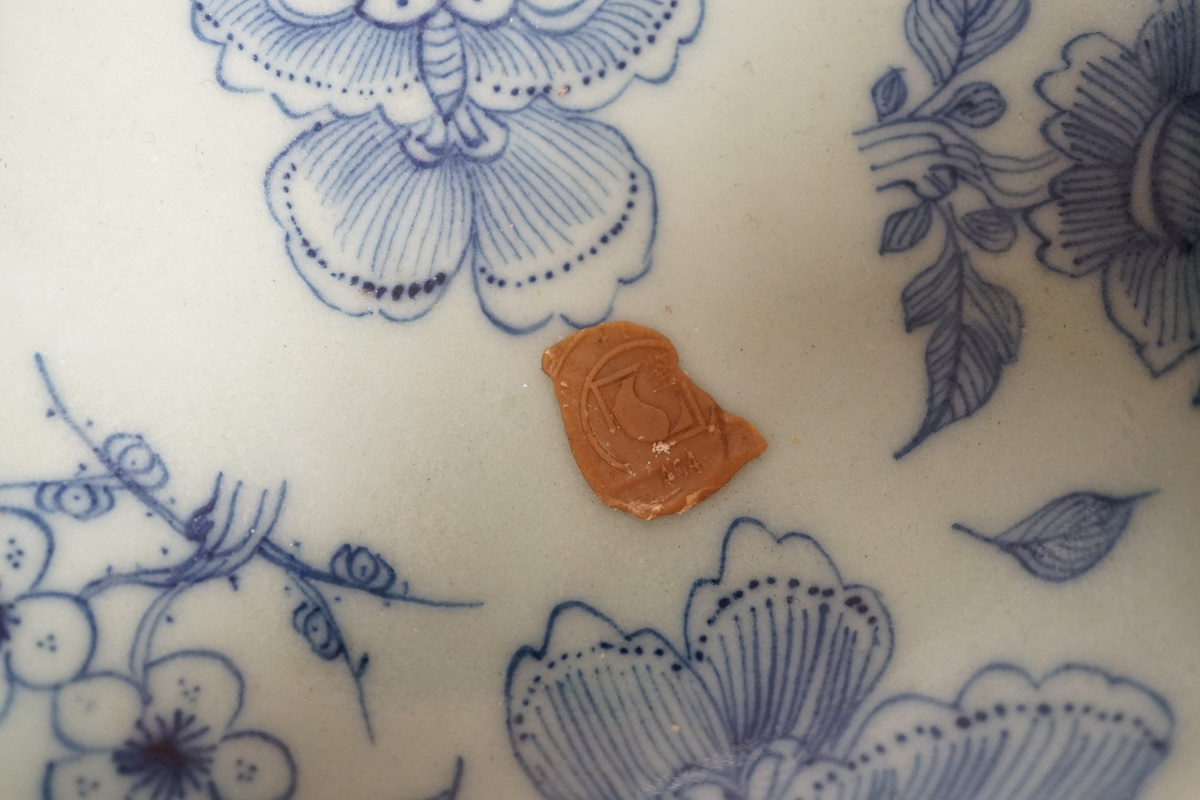 A Chinese blue and white celadon glazed dish, Qianlong seal mark, but 19th century, 15cm diameter